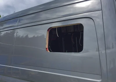 opening for side window installation on Sprinter Van