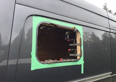 cutting out the opening for side window in Sprinter Van conversion