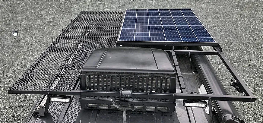 solar panels and roof vent on top of Mercedes Sprinter campervan conversion