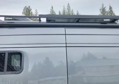 rooftop solar panels and Fiamma awnings on Mercedes Sprinter Van