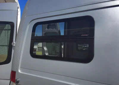 outside view of newly installed van conversion side window
