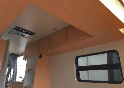windows and storage areas in Mercedes Sprinter Van conversion