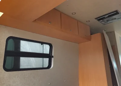 window and cupboards in Mercedes Sprinter Van conversion