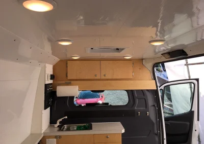 Overhead storage in Sprinter Van conversion